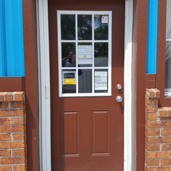 Screen Warehouse USA - a door with a sign on it - General Contractors Near Me - Lees Summit, Missouri