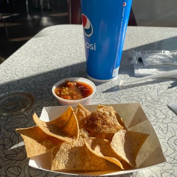 Lisa's Grill - Chips and salsa with the burrito and huge Arnold Palmer sweet tea! - American Near Me - Moriarty, New Mexico