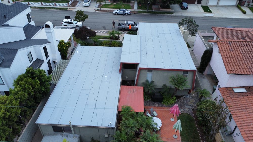 Slide of MMM Roofing