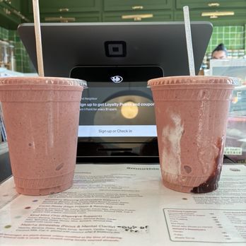 Kind Neighbor Juice Bar - Kind Skin Glow to the right and Peaceful Strawberry Smoothie to the left. - Juice Bars & Smoothies Near Me - Merced, California Kind Neighbor Juice Bar - Kind Skin Glow to the right and Peaceful Strawberry Smoothie to the left. - Juice Bars & Smoothies Near Me - Merced, California