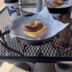 Cafe Italia - Cafe latte and breakfast bagel with egg, ham, and cheese