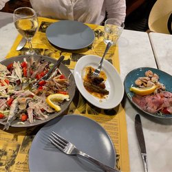 Osteria a cantina de Mananan - Seafood antipasto (squid, tuna carpaccio, shrimp, and multiple variations of anchovies)