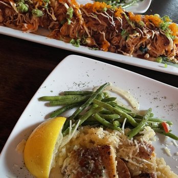 Chucks Fish - Grilled grouper with risotto split between two and the donkey on crack roll - Sushi Bars Near Me - Mobile, Alabama
