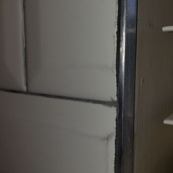 Xtreme Countertops - Badly scratched and damaged tiles left in place - Countertop Installation Near Me Xtreme Countertops - Badly scratched and damaged tiles left in place - Countertop Installation Near Me