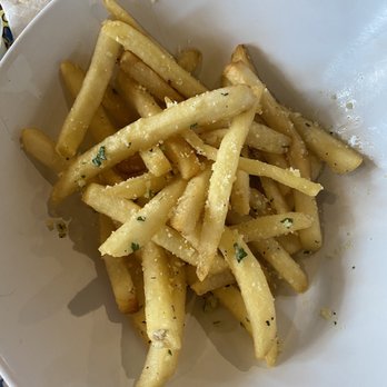 Viano's Pizza - Garlic Parmesan fries. This picture makes it look small but it's a generous portion. - Pizza Near Me - Riverside, California Viano's Pizza - Garlic Parmesan fries. This picture makes it look small but it's a generous portion. - Pizza Near Me - Riverside, California