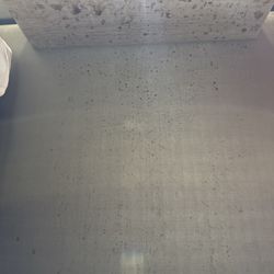 Mobypark - Ramada Amsterdam Airport Schiphol - Goedkoop parkeren - Stains on wall and under bedside table.