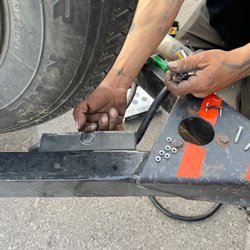 J Ledlow Automotive shop & Mobile RV repair - Jimmy fixing my cable