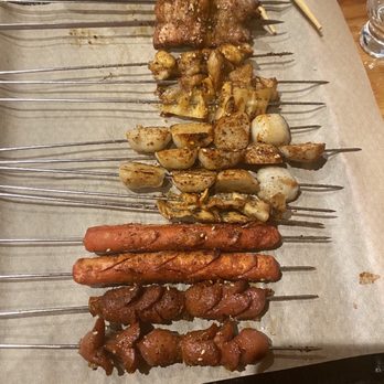 Volcano Skewer House - Sausages (hotdogs) fish balls, pork belly, chicken gizzards - Barbeque Near Me - Honolulu, Hawaii Volcano Skewer House - Sausages (hotdogs) fish balls, pork belly, chicken gizzards - Barbeque Near Me - Honolulu, Hawaii