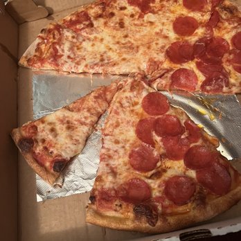 King of Pizza - Slight disparity in slice sizes. - Pizza Near Me - Cherry Hill, New Jersey King of Pizza - Slight disparity in slice sizes. - Pizza Near Me - Cherry Hill, New Jersey