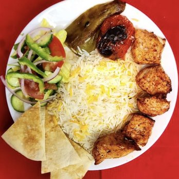Kebab Zone - a plate of food on a red table - Mediterranean Near Me - Glendale ca, California Kebab Zone - a plate of food on a red table - Mediterranean Near Me - Glendale ca, California