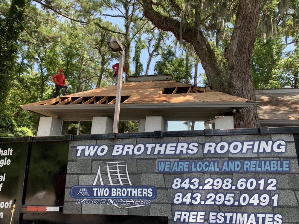 Slide of Two Brothers Roofing