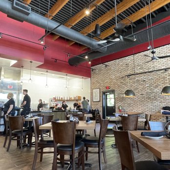 Russo’s New York Pizzeria - Table area and kitchen - Pizza Near Me - Broken Arrow, Oklahoma Russo’s New York Pizzeria - Table area and kitchen - Pizza Near Me - Broken Arrow, Oklahoma