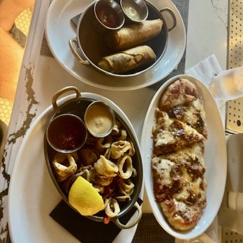 9Prime - Happy Hour food: Cheesesteak eggrolls, Calamari, Calabria flatbread. - Steakhouses Near Me - West Chester, Pennsylvania 9Prime - Happy Hour food: Cheesesteak eggrolls, Calamari, Calabria flatbread. - Steakhouses Near Me - West Chester, Pennsylvania