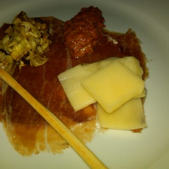 Elizabeth On 37th - Surry Ham appetizer from Virgina with manchego cheese and pecan-pimiento sauce - New American Near Me - Savannah, Georgia Elizabeth On 37th - Surry Ham appetizer from Virgina with manchego cheese and pecan-pimiento sauce - New American Near Me - Savannah, Georgia