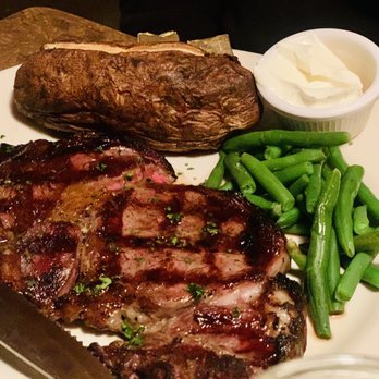 Zoey's Double Hex - Rib eye steak with baked potato. - American Near Me - Manchester, Vermont Zoey's Double Hex - Rib eye steak with baked potato. - American Near Me - Manchester, Vermont