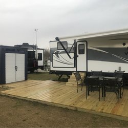 Skip-A-Way R V Park & Campground - Camper, deck and storage shed