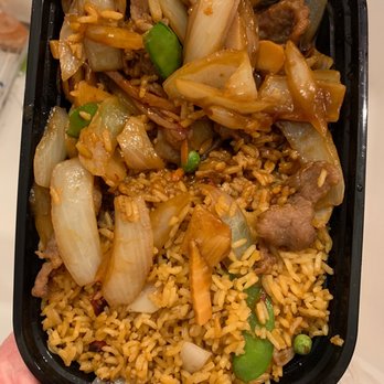 New China - a hand holding a container of food - Chinese Near Me - Crozet, Virginia New China - a hand holding a container of food - Chinese Near Me - Crozet, Virginia