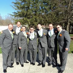 Grassy Hill Country Club - The groomsmen pose outside on the beautiful grounds on this sunny April afternoon!