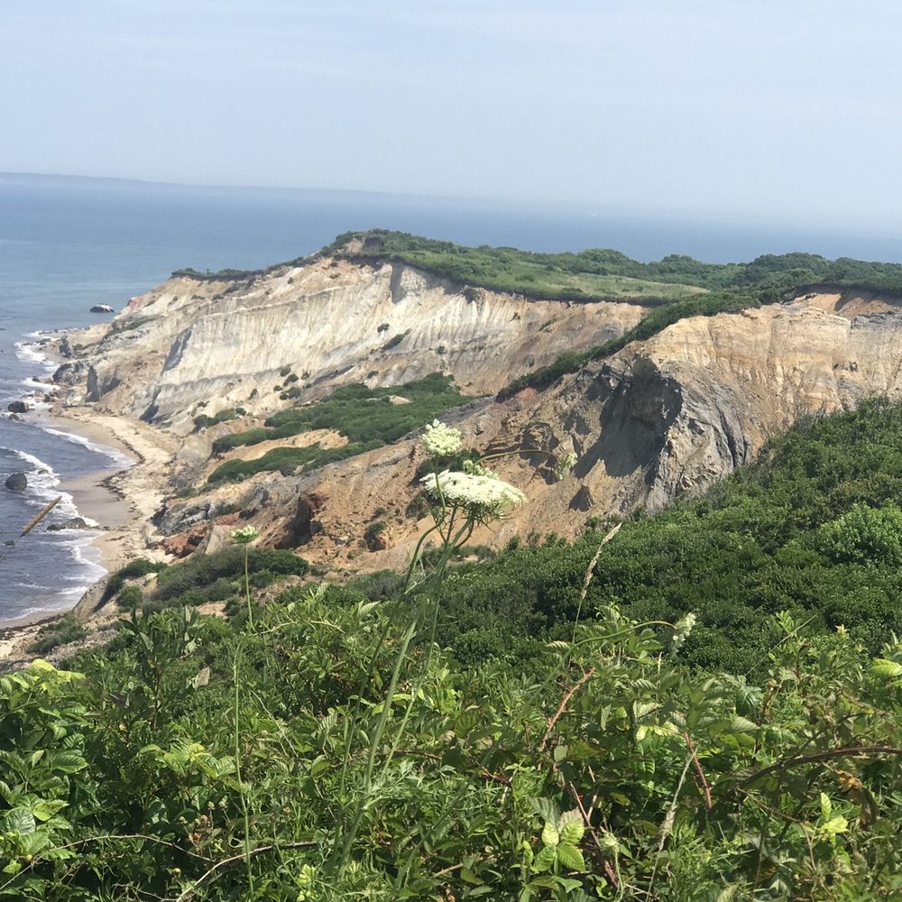 The lighthouse is off to the right overlooking the cliffs