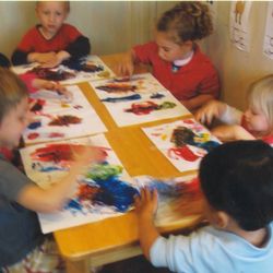 Ivette's Child Care - Ivette's Child Care pic of kids fingerpainting