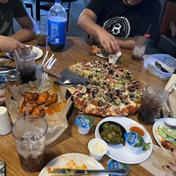 Round Table Pizza - Delicious!! Pizza, salad and wings were perfect cooked!  Thank you! =)
