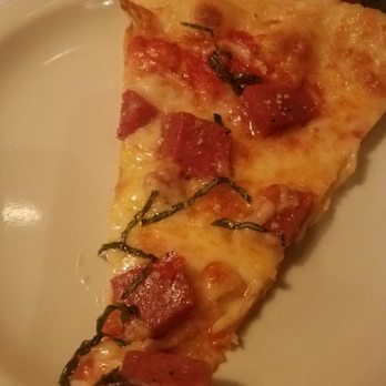 Tomato Street - Salami pizza with smoked gouda - Italian Near Me - Spokane, Washington Tomato Street - Salami pizza with smoked gouda - Italian Near Me - Spokane, Washington