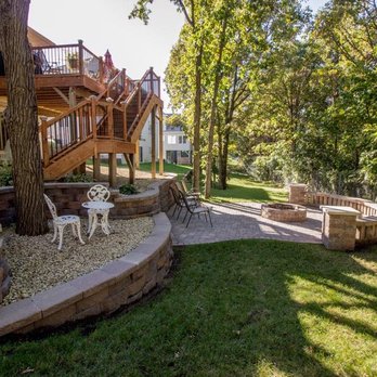 Best Outdoor Services - All new retaining walls and paver patio to create usable space on a hill in back yard - Landscaping Near Me - andover, Minnesota Best Outdoor Services - All new retaining walls and paver patio to create usable space on a hill in back yard - Landscaping Near Me - andover, Minnesota
