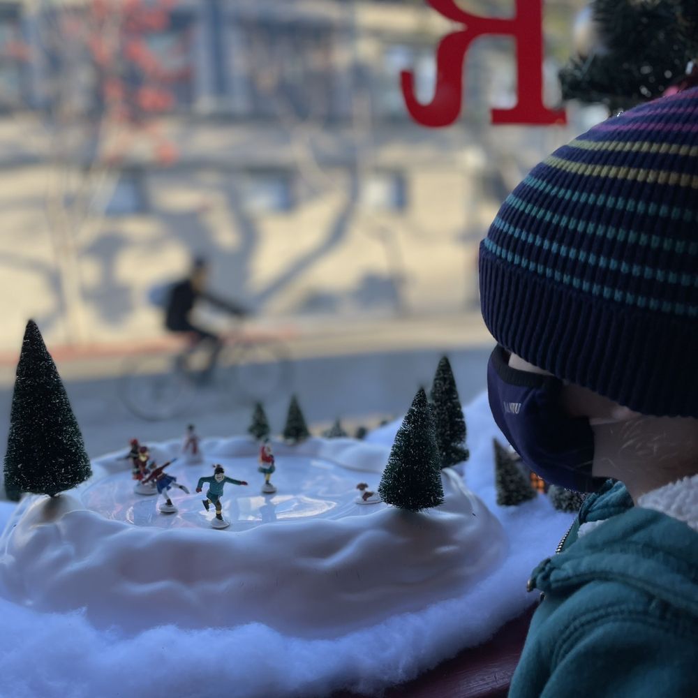 Red Rock Coffee - The littlest human enjoys the winter scene set up at Red Rocks, outside, a bicyclist passes. This is a quintessential Mountain View scene. - Coffee & Tea Near Me - Mountain View, California Red Rock Coffee - The littlest human enjoys the winter scene set up at Red Rocks, outside, a bicyclist passes. This is a quintessential Mountain View scene. - Coffee & Tea Near Me - Mountain View, California