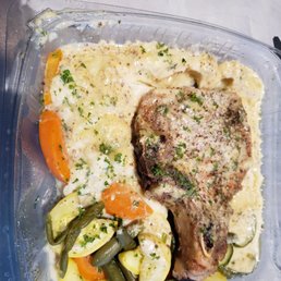 Pork chop with mashed potatoes and mixed vegetables. Pork chop with mashed potatoes and mixed vegetables.