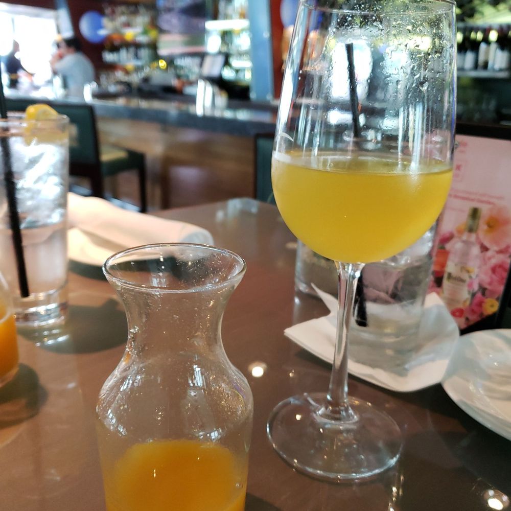 zinc@shade - Peach juice this time in my mimosa. That is the standard pour for that champagne glass - New American Near Me - Manhattan Beach, California zinc@shade - Peach juice this time in my mimosa. That is the standard pour for that champagne glass - New American Near Me - Manhattan Beach, California
