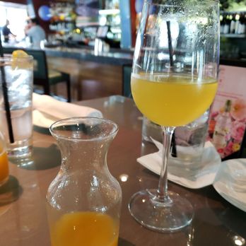 zinc@shade - Peach juice this time in my mimosa. That is the standard pour for that champagne glass - New American Near Me - Manhattan Beach, California zinc@shade - Peach juice this time in my mimosa. That is the standard pour for that champagne glass - New American Near Me - Manhattan Beach, California