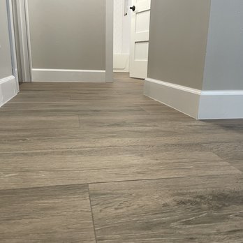 Tile Metrics - a hardwood floor in a hallway - Flooring Near Me - Oviedo, Florida Tile Metrics - a hardwood floor in a hallway - Flooring Near Me - Oviedo, Florida