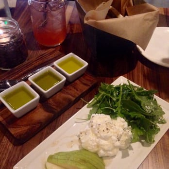 Parcht Bottleshop + Bites - Pear and fresh ricotta with arugula and honey drizzle! And olive oil tasting plate! Nom nom nom - New American Near Me - Taos, New Mexico