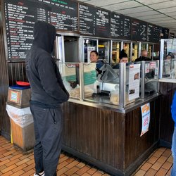 Dino's Subs - Menu & Cutting Area