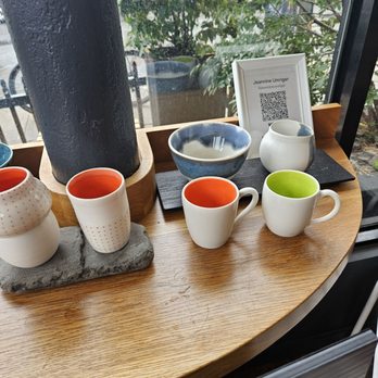 Coffee Mob - four cups of coffee on a table - Cafes Near Me - Brooklyn, New York Coffee Mob - four cups of coffee on a table - Cafes Near Me - Brooklyn, New York