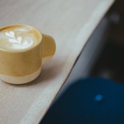 Village Coffee and Goods - Cortado in little mug by local pottery shop