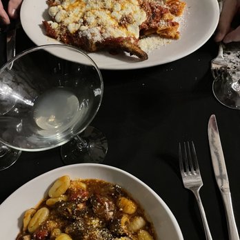 Maria's Cucina - Gf gnocchi in the forefront. Veal parmigiana in the background. - Italian Near Me - Providence, Rhode Island Maria's Cucina - Gf gnocchi in the forefront. Veal parmigiana in the background. - Italian Near Me - Providence, Rhode Island