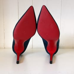 Strand Expert - Christian Louboutin Red rubber soles and heels.