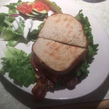 Maggie's Lunchbox - A BLT sandwich with a side salad on the plate. - American Near Me - Fenton, Missouri Maggie's Lunchbox - A BLT sandwich with a side salad on the plate. - American Near Me - Fenton, Missouri