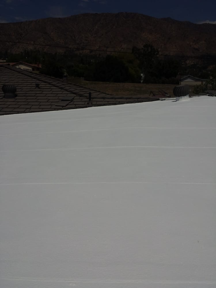 Slide of Advanced Roofing & Sons