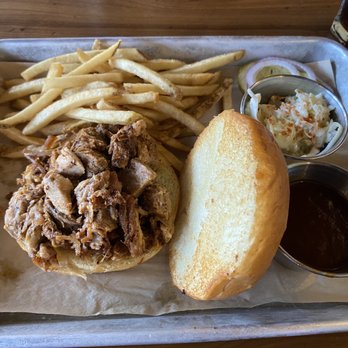Castle Cafe - Lean pulled pork sandwich with barbecue sauce on the side. - Bars Near Me - Castle Rock, Colorado