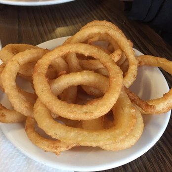 High Street Bistro - a plate of onion rings - Fish & Chips Near Me - Sutton, Ontario High Street Bistro - a plate of onion rings - Fish & Chips Near Me - Sutton, Ontario