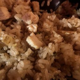 Dry hard flavorless fried rice with tough dry old chicken