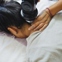 Dr. Chris Lipat | Mind-Body Energy Medicine - Dr. Chris Lipat DC uses the Vibracussor for deep tissue percussion therapy to aid in structural and fascial alignment and recovery.