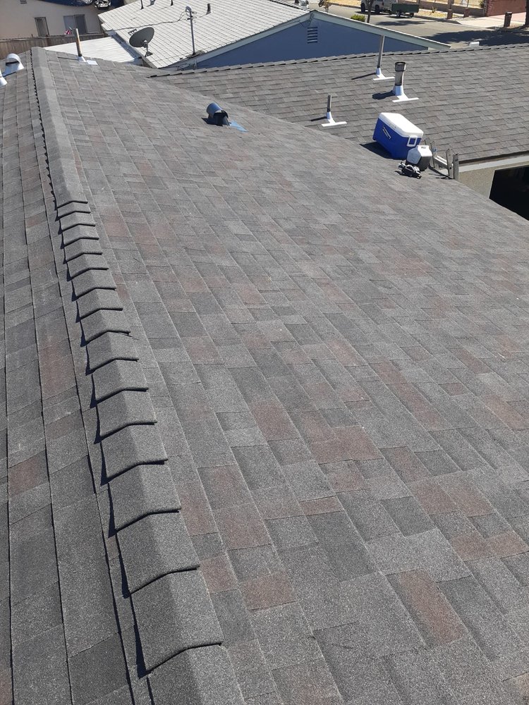 Slide of TopCal Roofing