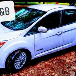 B&B Rides and Delivery - This is our hybrid car that allows us to give you a guaranteed low price, while helping the environment by lowering our emissions
