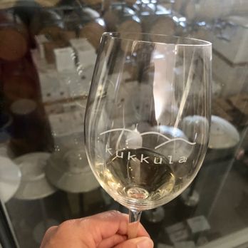 Kukkula Winery - a hand holding a wine glass - Wineries Near Me - Paso Robles, California