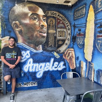 Dirt Dog Downey - Outside patio area with mural - Hot Dogs Near Me - Downey, California Dirt Dog Downey - Outside patio area with mural - Hot Dogs Near Me - Downey, California
