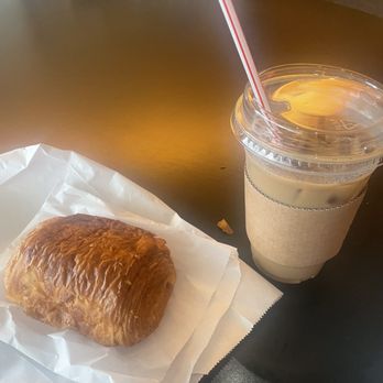 Gotham Cafe - Pumpkin iced coffee with oatmilk, chocolate croissant - Coffee & Tea Near Me - New York, New York