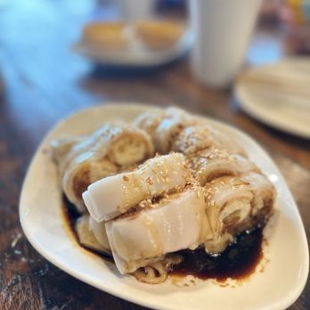 Dim Dim Sum - a plate of food on a table - Dim Sum Near Me - Windermere, Florida Dim Dim Sum - a plate of food on a table - Dim Sum Near Me - Windermere, Florida